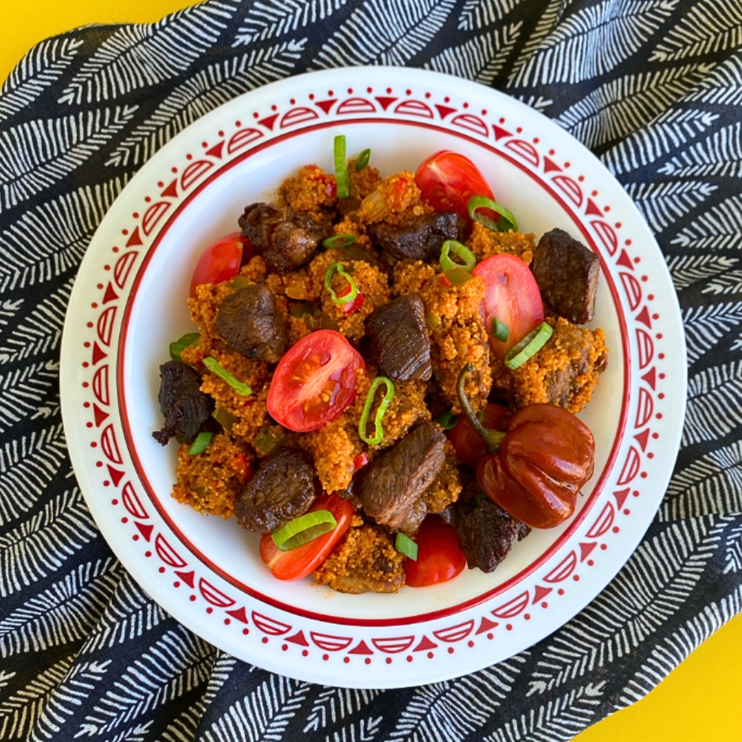 Jollof Fonio with Marinated Sirloin