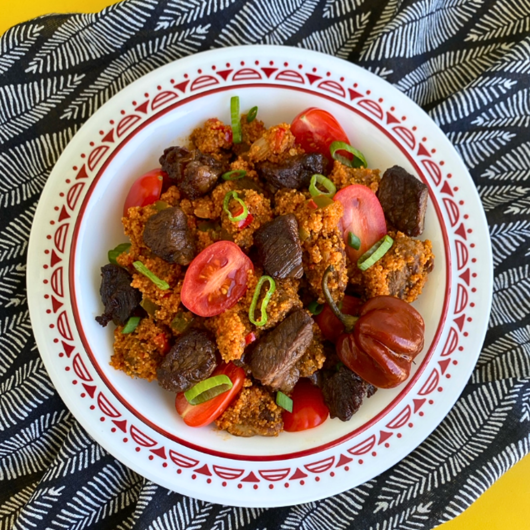 Jollof Fonio with Marinated Sirloin